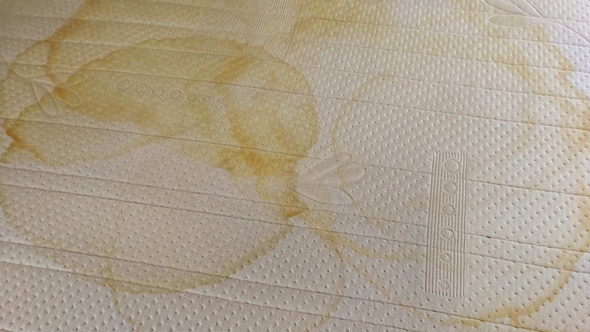 Linen sheets with stubborn stains on